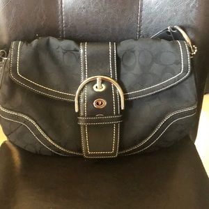 Medium sized black coach bag